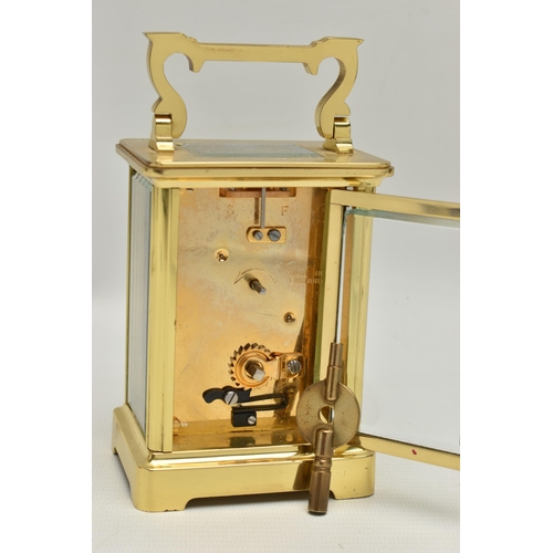 189 - A 'H.SAMUEL' BRASS CARRIAGE CLOCK, key wound, Roman numeral dial, in working order time keeping unte... 