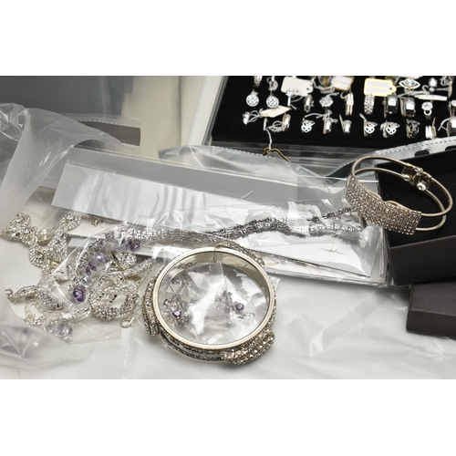 202 - BOXED AND LOOSE SETS OF COSTUME JEWELLERY, to include a ring box with mostly white metal rings, a lo... 