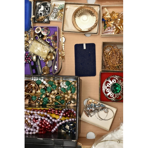 206 - TWO BOXES OF COSTUME JEWELLERY, to include a cream jewellery box, an old First Aid tin box containin... 