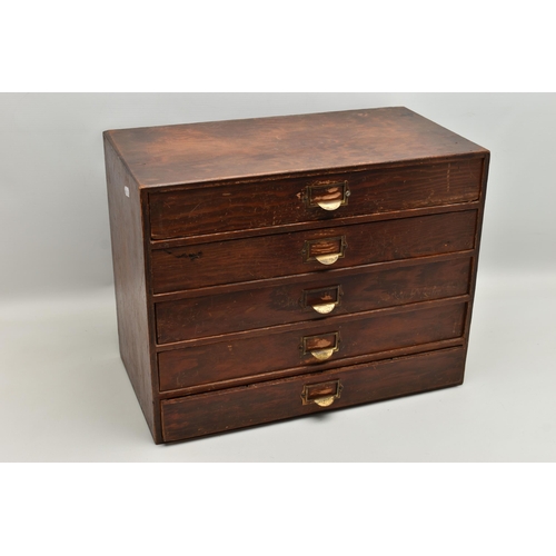 211 - A WATCH MAKERS WOODEN CHEST/DRAWERS CONTAINING WATCH PARTS AND STRAPS, TOOLS AND MISCELLANEOUS ITEMS... 