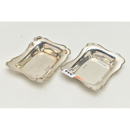 234 - TWO EARLY 20TH CENTURY SILVER BONBON DISHES, each of a rectangular from with wavy edges, hallmarked ... 