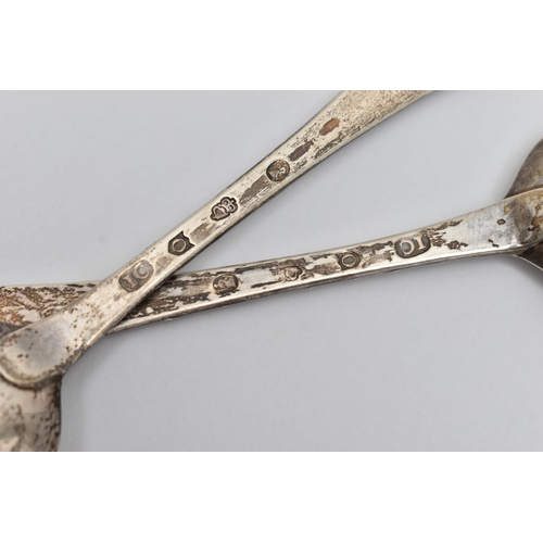 236 - A PAIR OF GEORGE III IRISH SILVER FRUIT SPOONS, worn silver gilt fluted bowls, the handles later cha... 