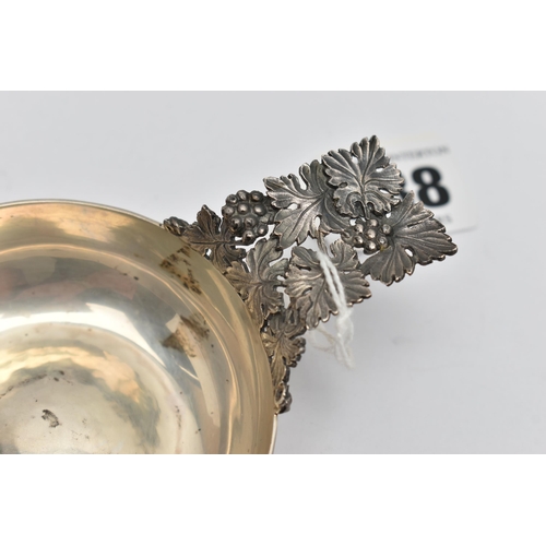 238 - AN ELIZABETH II HECTOR MILLER SILVER WINE TASTER, planished bowl with cast and pierced fruiting vine... 