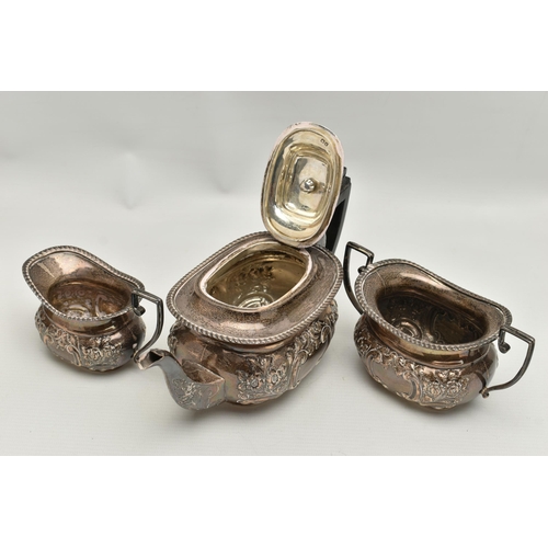 243 - A LATE VICTORIAN SILVER THREE PIECE BACHELOR'S TE SET OF OVAL FORM, gadrooned rims, foliate repoussé... 