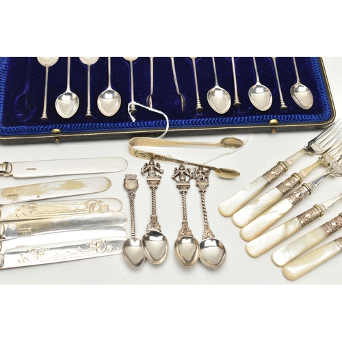 250 - A CASED SET OF ELEVEN GEORGE V SILVER RAT TAIL PATTERN SEAL END TEASPOONS AND MATCHING SUGAR TONGS, ... 