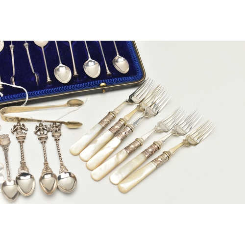 250 - A CASED SET OF ELEVEN GEORGE V SILVER RAT TAIL PATTERN SEAL END TEASPOONS AND MATCHING SUGAR TONGS, ... 