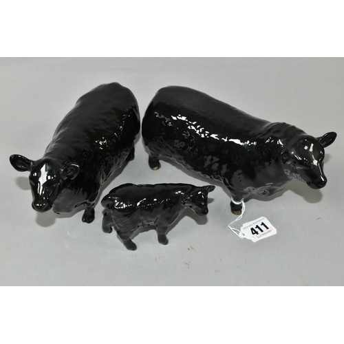 411 - THREE BESWICK FIGURES OF ABERDEEN ANGUS CATTLE, comprising Aberdeen Angus Bull model no 1562, Aberde... 