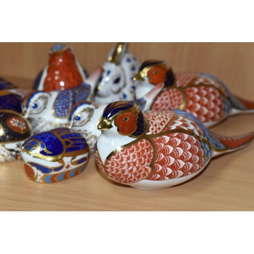 417 - NINE ROYAL CROWN DERBY PAPERWEIGHTS, comprising two Pheasants (one with silver stopper, the other mi... 