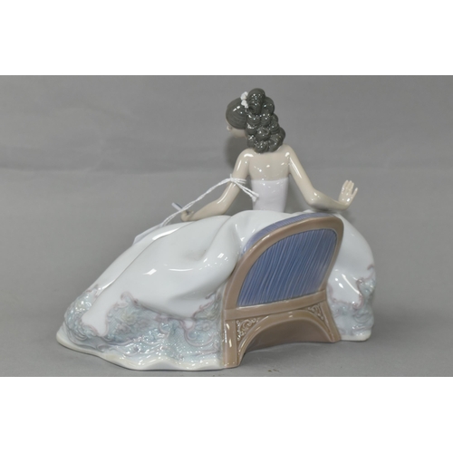 418 - A LLADRO 'AT THE BALL' FIGURINE, no 5859, depicting a seated lady in a ball gown holding a fan, scul... 