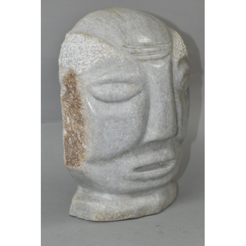 422 - AN AFRICAN GREY MARBLE HEAD OF A MALE, polished to front, the sides and back unpolished, B K and * s... 