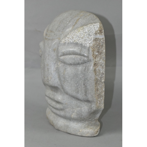 422 - AN AFRICAN GREY MARBLE HEAD OF A MALE, polished to front, the sides and back unpolished, B K and * s... 