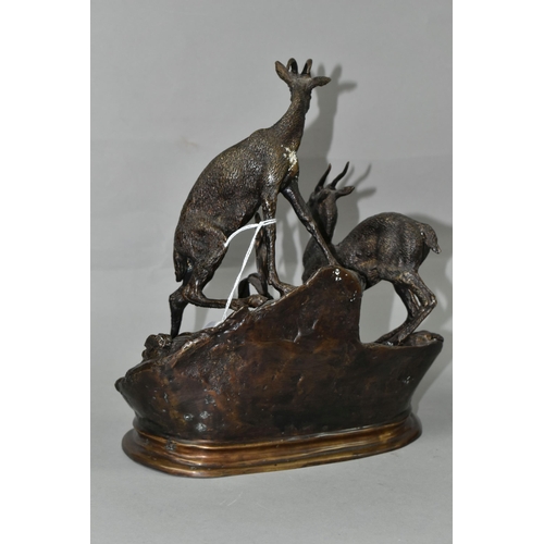 425 - A HOLLOWCAST BRONZE FIGURE GROUP AFTER JULES MOIGNEZ (FRENCH, 1835-1894), depicting a pair of mounta... 