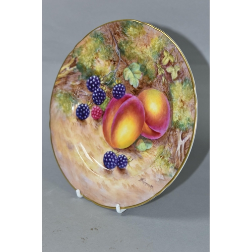 430 - A ROYAL WORCESTER HAND PAINTED FRUIT STUDY SIDE PLATE, signed (John) Freeman, painted with peaches a... 