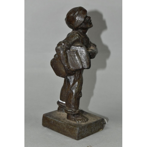 431 - A BRONZED CAST IRON QUALCAST ADVERTISING FIGURE OF A NEWS BOY, titled 'Speshul', impressed Qualcast ... 