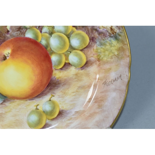 432 - A ROYAL WORCESTER HAND PAINTED FRUIT STUDY SIDE PLATE, signed (John) Freeman, painted with apples an... 