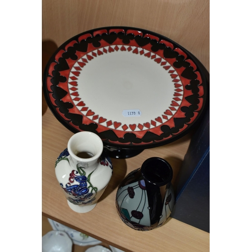 433 - THREE PIECES OF MOORCROFT POTTERY, comprising a boxed Alice in Wonderland collection cake stand, tub... 