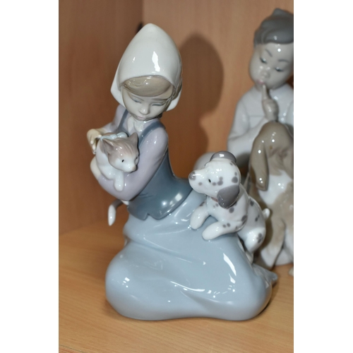 438 - THREE LLADRO FIGURES, comprising Boy with Dog no 4522, sculptor Vicente Martinez, issued 1970-1998, ... 