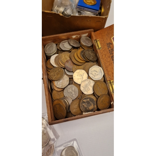 253 - A HEAVY BOX CONTAINING WORLD COINS AND BANKNOTES, to include mixed world coinage 11 x UK  £5 coins c... 