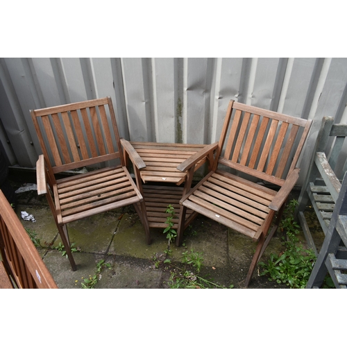 1003 - A STAINED TEAK SLATTED GARDEN BENCH, length 119cm, along with a two seater teak garden love seat/ben... 