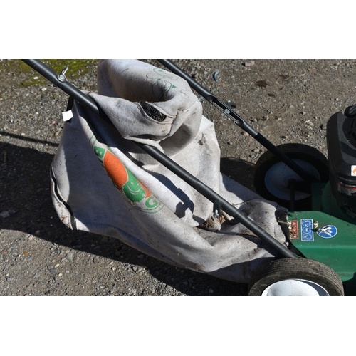 1026 - A BILLY GOAT LAWN VACUUM, with a Briggs and Stratton 625 petrol engine (pulls freely but not started... 