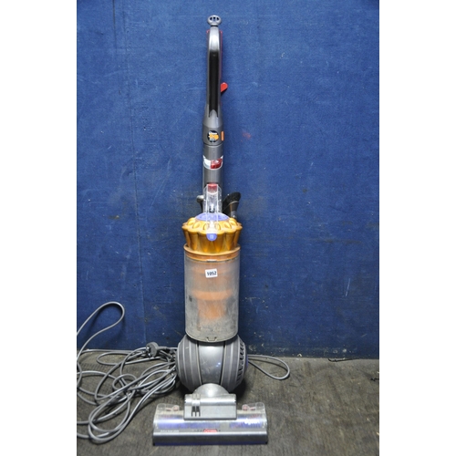 1052 - A DYSON DC41 VACUUM with one attachment (PAT Pass and Working)