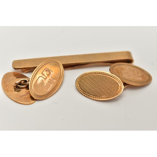 32 - A CASED 9CT GOLD PAIR OF CUFFLINKS AND A TIE CLIP, Automotive Products Group Golden Jubilee case, wi... 