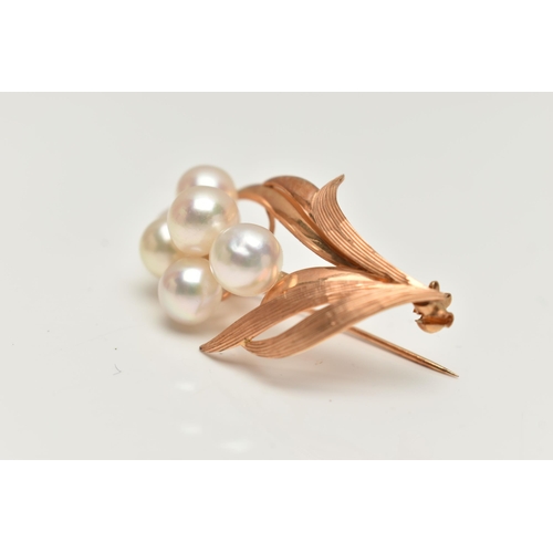 34 - A YELOW METAL CULTURED PEARL BROOCH, floral design set with a cluster of six cultured white pearls e... 