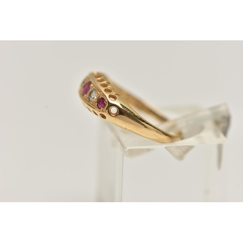 40 - AN EARLY 20TH CENTURY RUBY AND DIAMOND, 18CT GOLD BOAT RING, set with three circular cut rubies, int... 