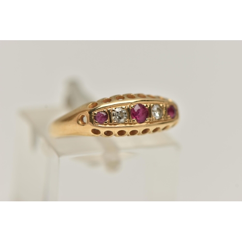 40 - AN EARLY 20TH CENTURY RUBY AND DIAMOND, 18CT GOLD BOAT RING, set with three circular cut rubies, int... 