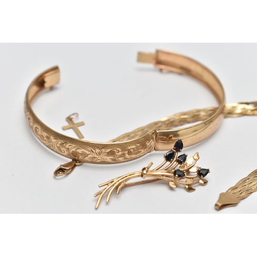 48 - FOUR ITEMS OF JEWELLERY, to include a hinged 9ct gold bangle with engraved scrolling acanthus leaf d... 