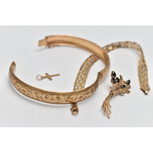 48 - FOUR ITEMS OF JEWELLERY, to include a hinged 9ct gold bangle with engraved scrolling acanthus leaf d... 