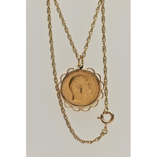 64 - A HALF SOVEREIGN COIN PENDANT NECKLACE, Edward VII half sovereign, dated 1903, in a collet mount wit... 