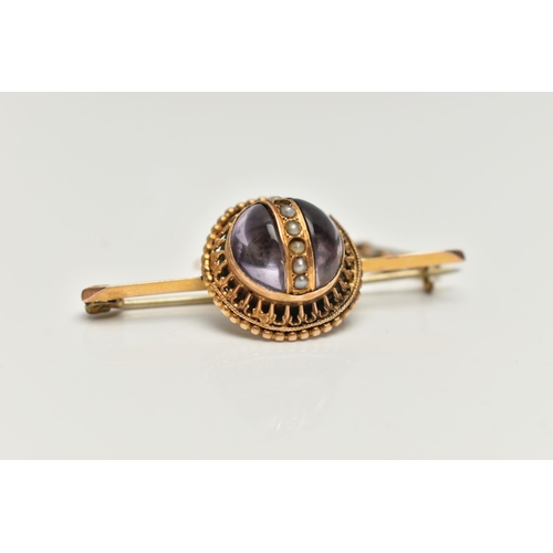 73 - A VICTORIAN BROOCH, principal cabochon amethyst, decorated with a centrally positioned band of yello... 