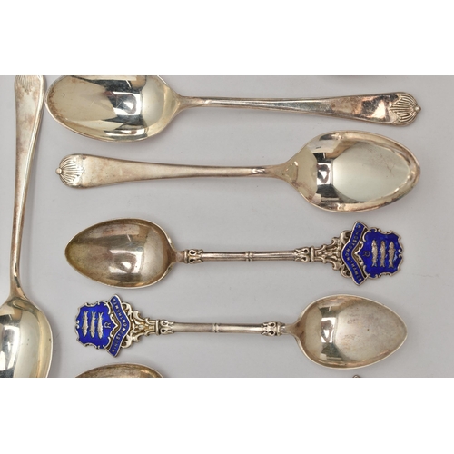 83 - A SET OF TWELVE GEORGE V SILVER TEASPOONS AND THREE GEORGE V SILVER AND ENAMEL 'KINGSTON-ON-THAMES' ... 