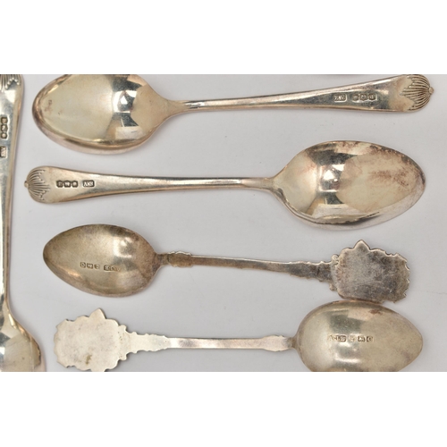 83 - A SET OF TWELVE GEORGE V SILVER TEASPOONS AND THREE GEORGE V SILVER AND ENAMEL 'KINGSTON-ON-THAMES' ... 