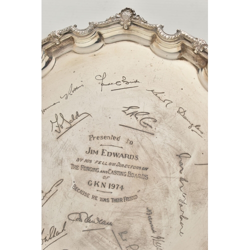 87 - AN ELIZABETH II SILVER SALVER, FOLIATE CAST AND PIE CRUST BORDER, the centre engraved with presentat... 