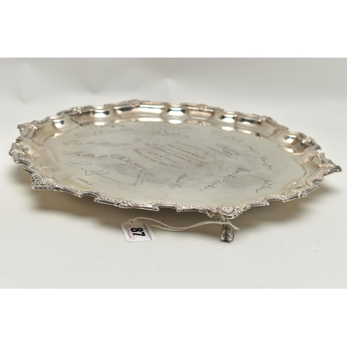 87 - AN ELIZABETH II SILVER SALVER, FOLIATE CAST AND PIE CRUST BORDER, the centre engraved with presentat... 