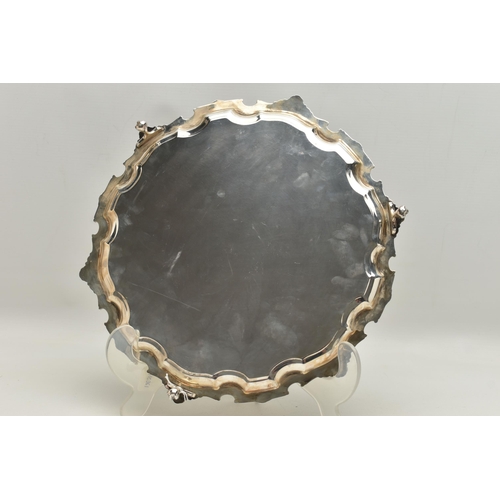 87 - AN ELIZABETH II SILVER SALVER, FOLIATE CAST AND PIE CRUST BORDER, the centre engraved with presentat... 