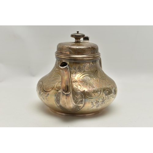 92 - A VICTORIAN IRISH SILVER TEAPOT OF SQUAT PEAR SHAPE, domed cover with knop finial, foliate scroll en... 