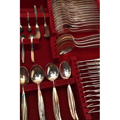 125 - A DUTCH GERO SILVER GILT PLATED CANTEEN OF CUTLERY FOR TWELVE PLACE SETTINGS, housed in two fitted d... 