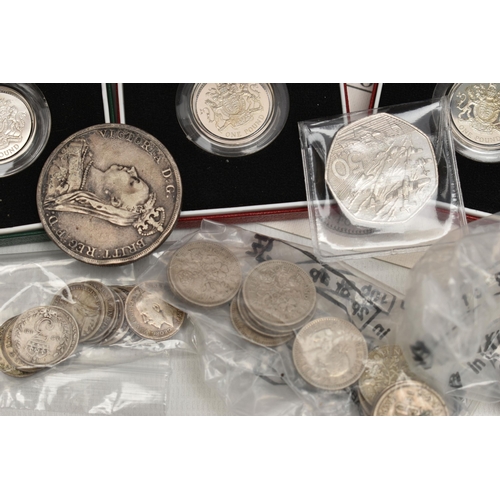 128 - A BOX OF MIXED COINS, to include a small bag of George V Three Pence coins, a small bag of Six Pence... 