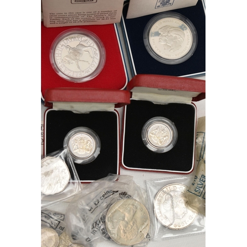 128 - A BOX OF MIXED COINS, to include a small bag of George V Three Pence coins, a small bag of Six Pence... 