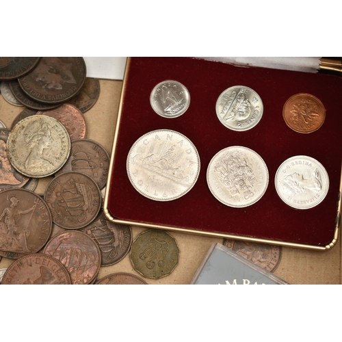 129 - A SHOE BOX  OF MIXED COINAGE, to include a Canada 1984 boxed year set, Royal Mint D-Day landing 50p ... 