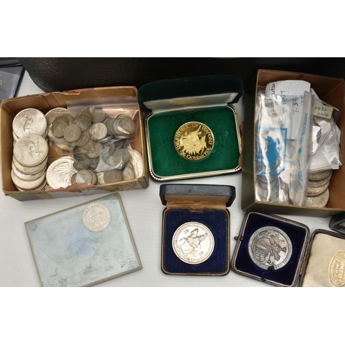 131 - A VANITY CASE CONTAINING COINS AND MEDALS, to include lots of items with a South Africa influence wi... 