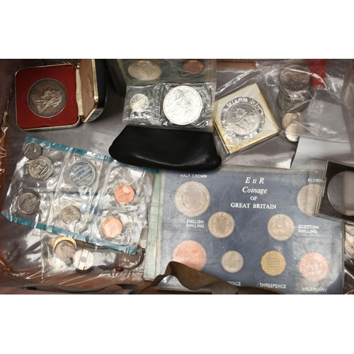 131 - A VANITY CASE CONTAINING COINS AND MEDALS, to include lots of items with a South Africa influence wi... 