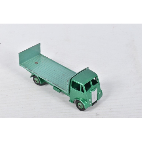 26 - FIVE UNBOXED AND ASSORTED DINKY TOYS GUY LORRIES AND VANS, all have been modified, rebuilt and/or re... 