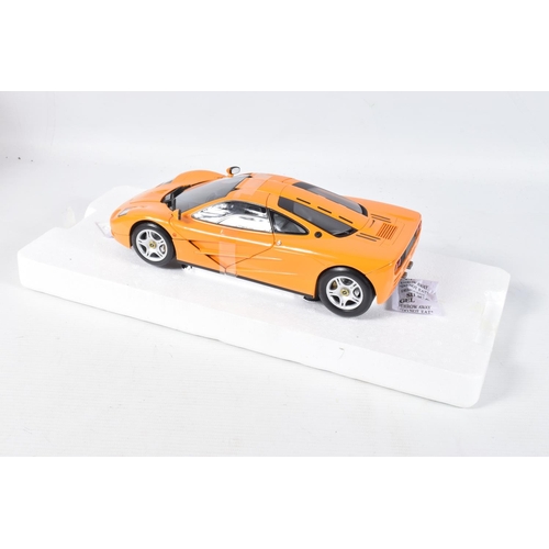 3 - A BOXED MINICHAMPS MCLAREN F1 ROAD CAR 1994 1:18 MODEL VEHICLE, numbered 530 133421, painted orange,... 