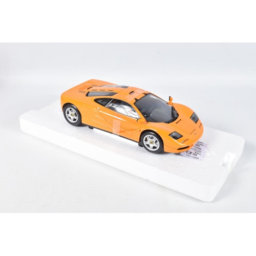 3 - A BOXED MINICHAMPS MCLAREN F1 ROAD CAR 1994 1:18 MODEL VEHICLE, numbered 530 133421, painted orange,... 