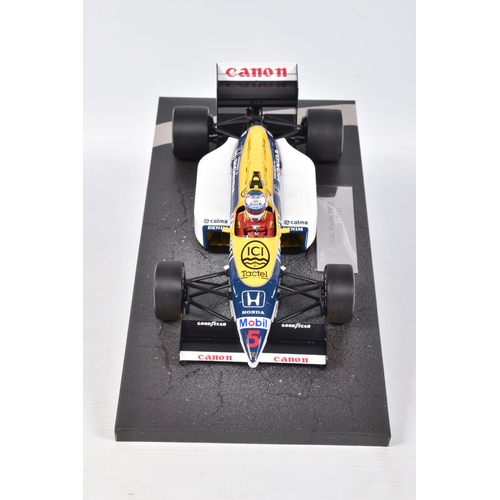 40 - A BOXED MINICHAMPS WILLIAMS HONDA FW11 N. MANSELL 1986 SCALE 1:18 MODEL VEHICLE, numbered 117 860005... 