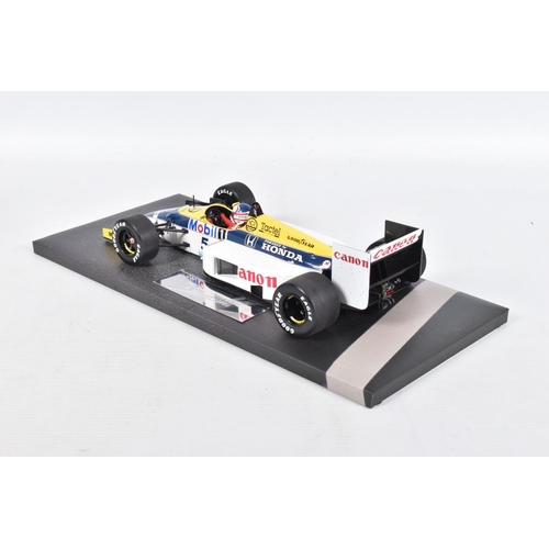 40 - A BOXED MINICHAMPS WILLIAMS HONDA FW11 N. MANSELL 1986 SCALE 1:18 MODEL VEHICLE, numbered 117 860005... 